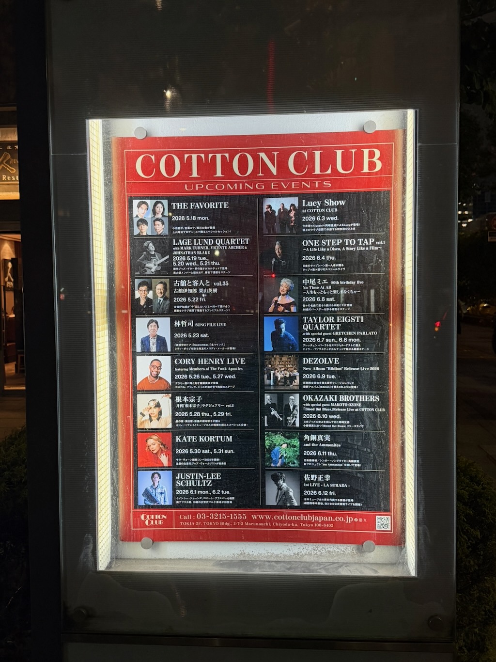 Cotton Club 入口的節目表燈箱，列著 LAGE LUND QUARTET 等近期演出